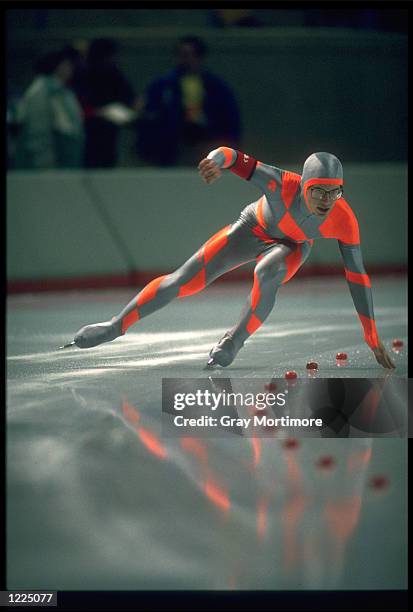 M GREENWALD OF THE UNITED STATES POWERS ROUND A BEND DURING A HEAT OF THE MENS 1500 METRE SPEED SKATING COMPETITION AT THE 1988 WINTER OLYMPICS IN...