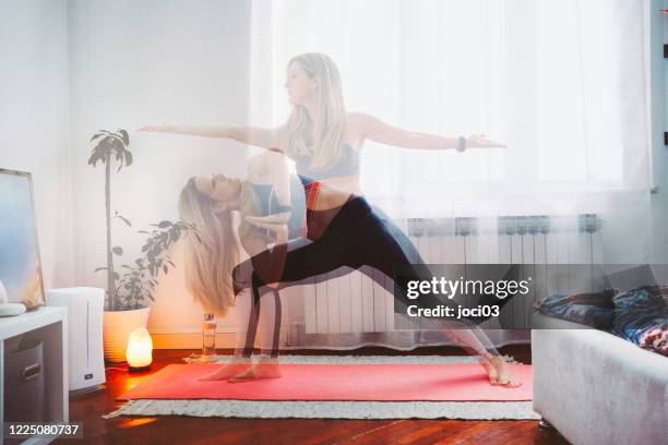 woman doing yoga at home - multiple exposure sports stock pictures, royalty-free photos & images