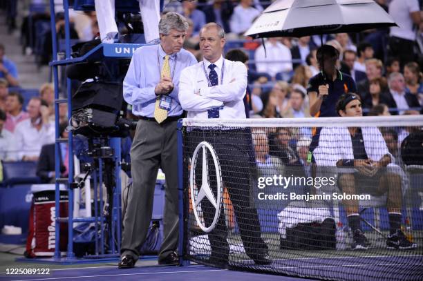 Tournament referee Brian Earley talks with grand slam supervisor Wayne McKewen during the 2011 US Open at the USTA Billie Jean King National Tennis...