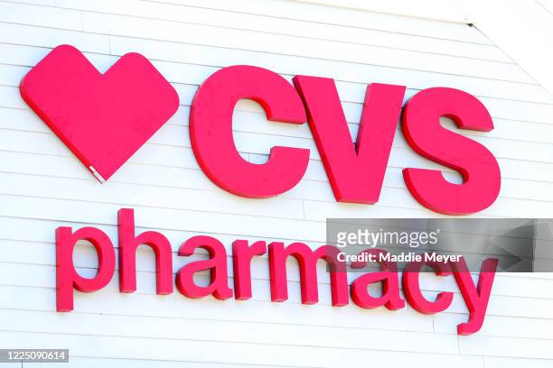 Sign on the side of the CVS Pharmacy on May 15, 2020 in Carver, Massachusetts. Nine CVS locations began providing coronavirus tests in Massachusetts,...