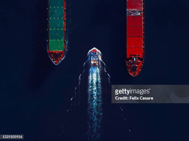 aerial top view marine traffic at the harbour. large transport shipping at the port. - global service stock pictures, royalty-free photos & images
