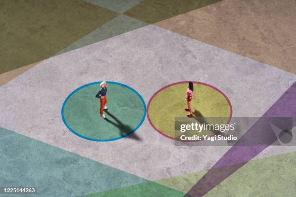 conceptual image of social distancing - límite fotografías e imágenes de stock