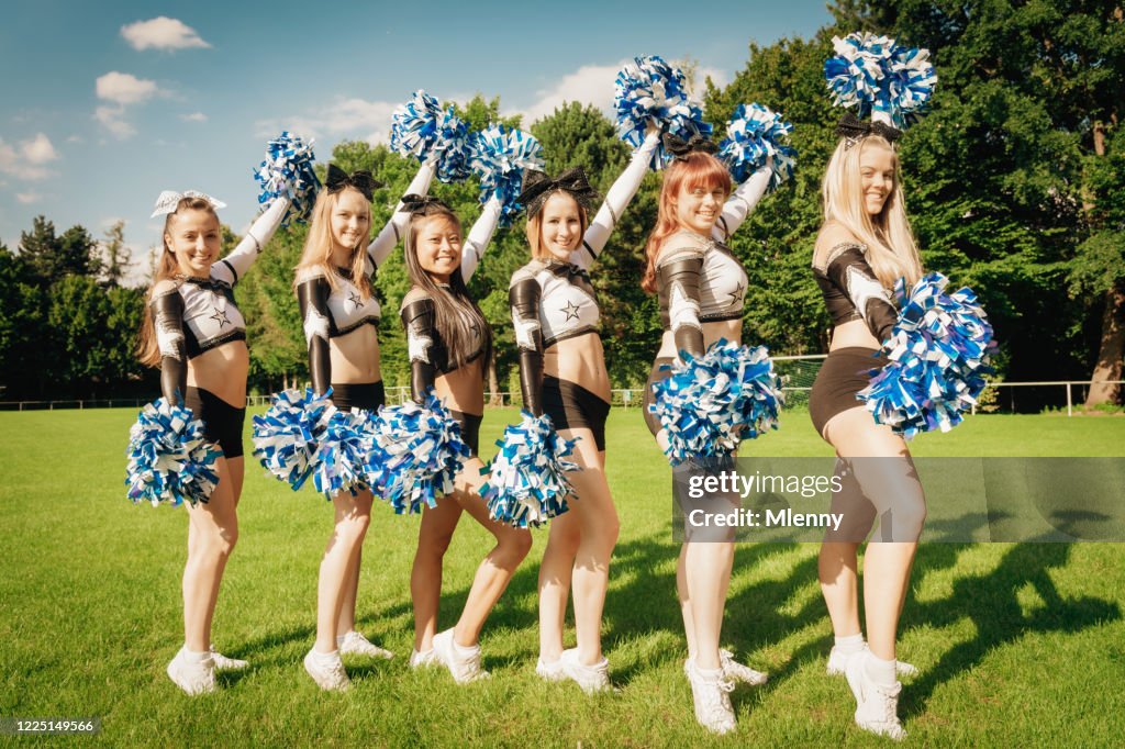 Cheer Line Cheer Line Smiling Cheerleader Girls High-Res Stock Photo - Getty Images