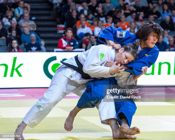 Olympic and World champion, Tina Trstenjak of Slovenia throws Masako Doi of Japan for a wazari that eventually won the u63kg quarter-final contest...