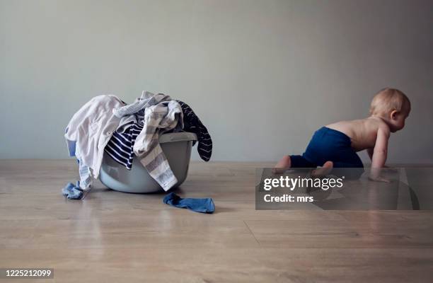 laundry day - laundry basket stock pictures, royalty-free photos & images