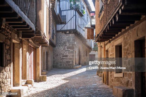 street of the town called "la alberca", in the province of salamanca. - tapered roots stock pictures, royalty-free photos & images