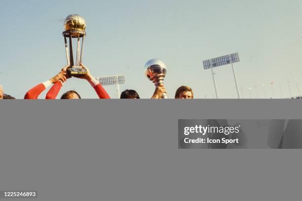 Enzo TROSSERO, Pedro MONZON and Claudio MARANGONI of Independiente celebrate the victory with the trophy during the Intercontinental Cup, Toyota Cup...