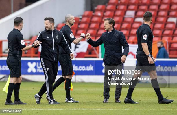 Fulham's manager Scott Parker bumps fists with the officials at the end of the match during the Sky Bet Championship match between Nottingham Forest...