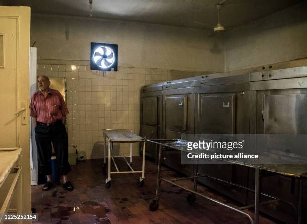 July 2020, Egypt, Giza: A man stand inside the morgue of the 6th of October Central Hospital, which is currently serving as an isolation hospital for...