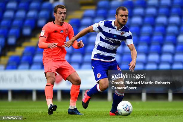 Reading's George Puscas in action during the Sky Bet Championship match between Reading and Huddersfield Town at Madejski Stadium on July 7, 2020 in...