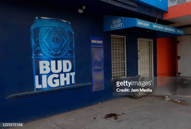 Bud Light" beer store is seen closed due to lack of products on May 16, 2020 in Monterrey, Mexico. Considered nonessential, brewing has to stop...