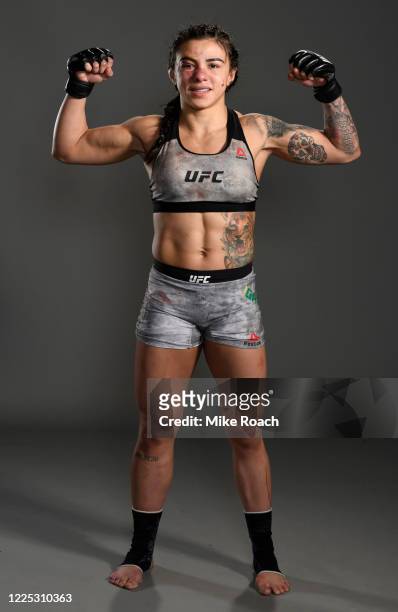Claudia Gadelha of Brazil poses for a portrait backstage after her victory during the UFC fight night event at VyStar Veterans Memorial Arena on May...