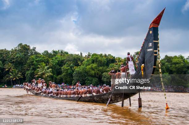 aranmula snake boat race on pampa river at onam festival, aranmula, kerala, india. - kerala snake boat stock pictures, royalty-free photos & images