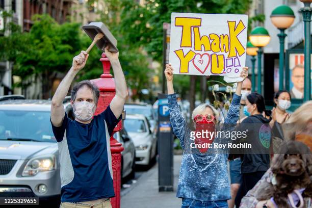 Residents come to cheer and thank medical workers at Lenox Hill Hospital on May 16, 2020 Lenox Hill Hospital in New York City. COVID-19 has spread to...