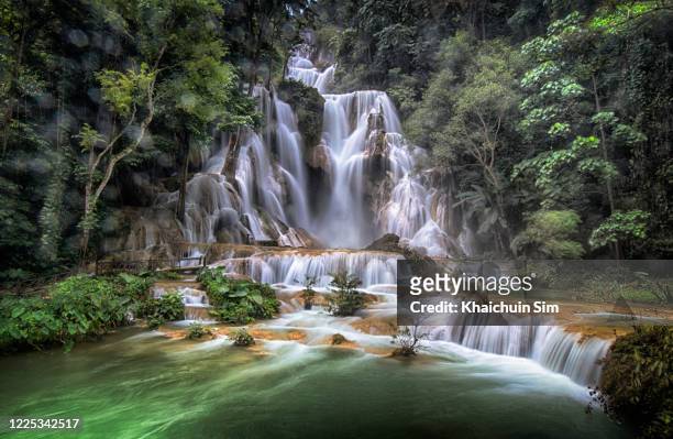 kuang si waterfalls - kuang si falls stock pictures, royalty-free photos & images
