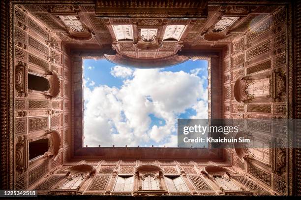 old india building with blue sky - zone géographique historique photos et images de collection