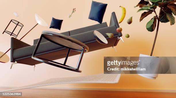 concept of living room with furniture flying through the air - flying stock pictures, royalty-free photos & images