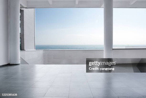 sea view empty large living room of luxury summer beach house - beach deck stock pictures, royalty-free photos & images