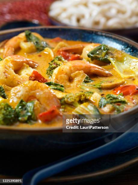 shrimp curry soup with thick noodles and vegetables - curry powder stock pictures, royalty-free photos & images