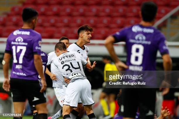 Alejandro Gomez of Atlas celebrates with his teammates after scoring the first goal of his team during the match between Atlas and Mazatlan FC as...