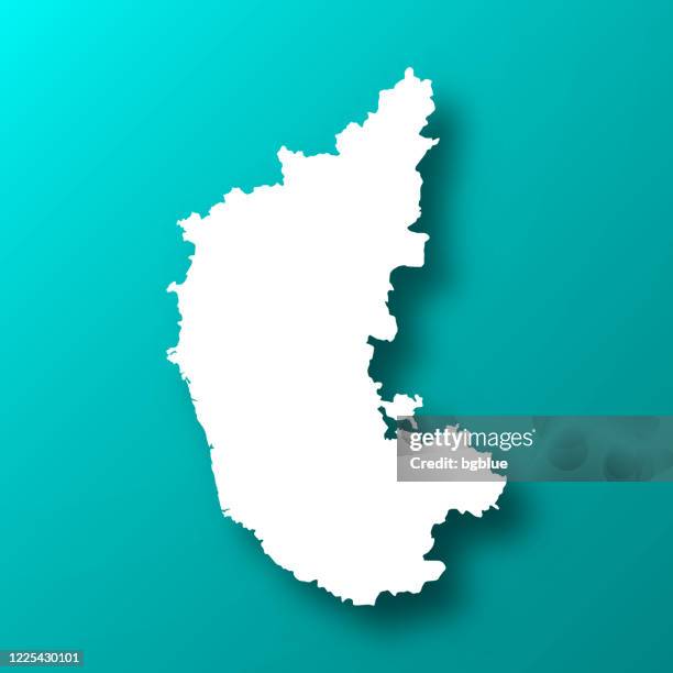 karnataka map on blue green background with shadow - karnataka stock illustrations