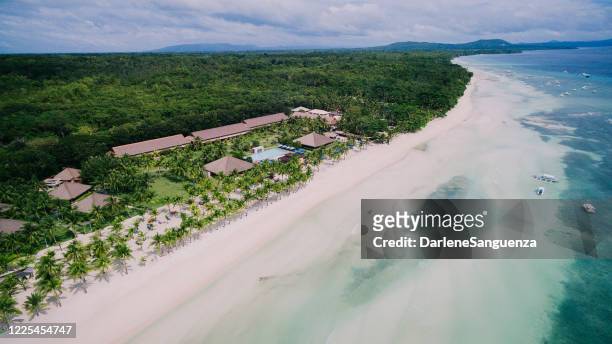 top view aerial drone shot of beautiful white sand beach in panglao, bohol, philippines - bohol stock pictures, royalty-free photos & images