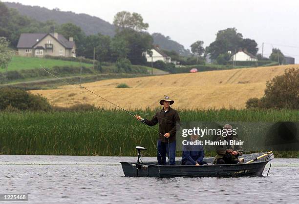 Matthew Hayden and Wade Seccombe of Australia enjoy some fishing, in a lake outside Belfast, Ireland. DIGITAL IMAGE Mandatory Credit: Hamish...