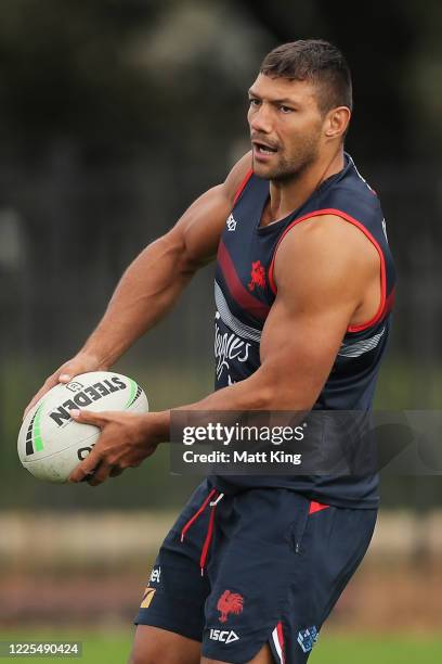 Ryan Hall passes during a Sydney Roosters NRL training session at Kippax Lake Field on May 18, 2020 in Sydney, Australia.