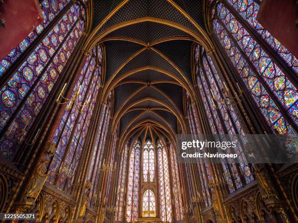 gothic arch ceiling and stained glass window saint chapelle, paris, france - the sainte chapelle paris stock pictures, royalty-free photos & images