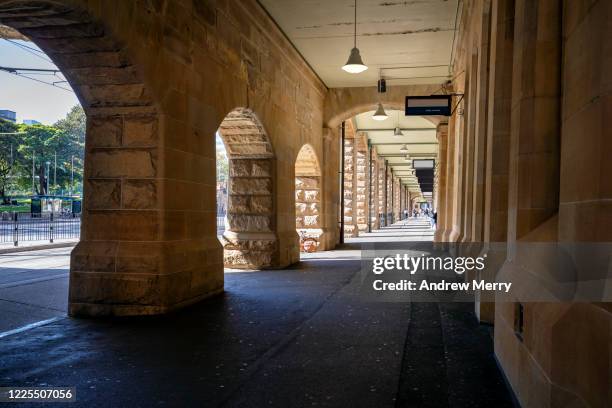 empty street and footpath during coronavirus lockdown, social distancing, sydney, australia - central station sydney ストックフォトと画像