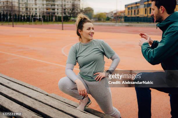 working out with personal trainer - running coach stock pictures, royalty-free photos & images