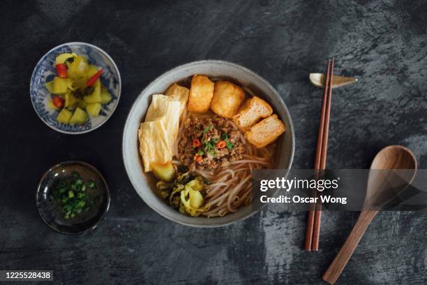 flat lay shot of asian noodle soup served on the table - chinese food stock pictures, royalty-free photos & images