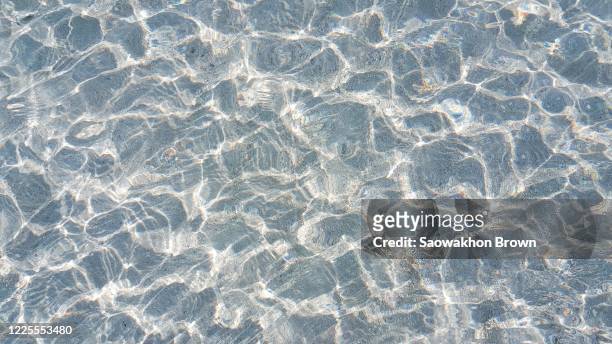 abstract clear water background - calm water stock pictures, royalty-free photos & images