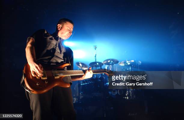 American Rock & Nu Metal musician Mike Mushok, of the group Staind, plays guitar as he performs onstage at the Hammerstein Ballroom, New York, New...