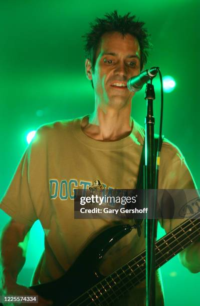 American Rock & Nu Metal musician Johnny April, of the group Staind, plays bass guitar as he performs onstage at the Hammerstein Ballroom, New York,...