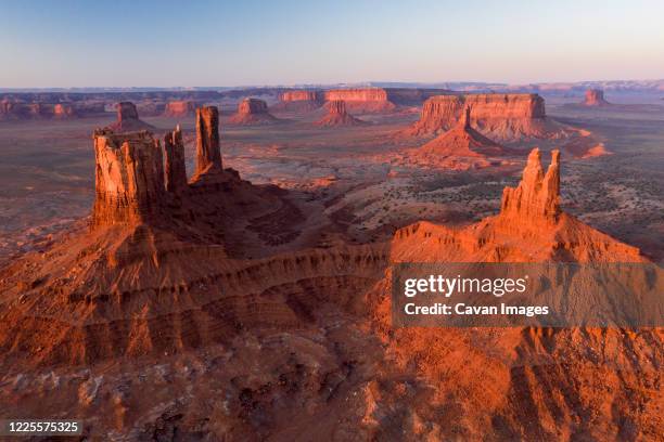 aerial panoramas of desert landscape of iconic monument valley i - monument valley stock pictures, royalty-free photos & images