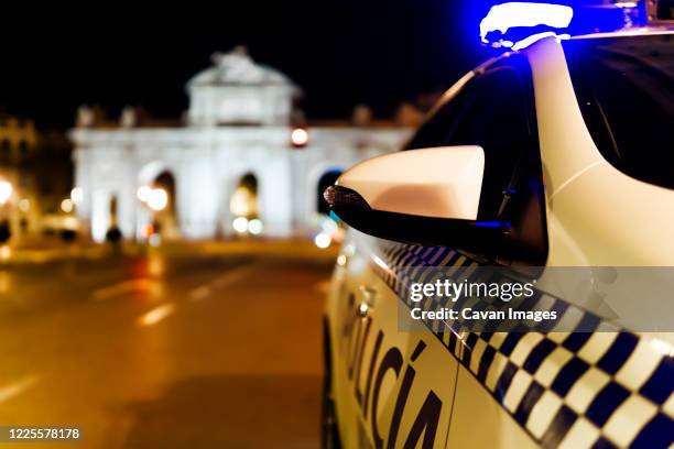 patrol car guarding the streets of madrid - crime prevention stock pictures, royalty-free photos & images