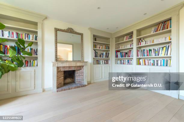 living room in a luxury apartment. - hardwood stock pictures, royalty-free photos & images