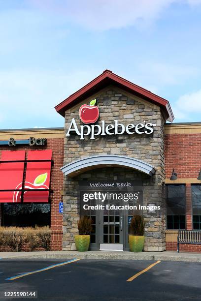 Entrance to Applebee's restaurant with logo above door, northern Idaho.