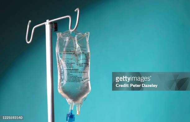 iv drip with green copy space - hospital quarantine stock pictures, royalty-free photos & images