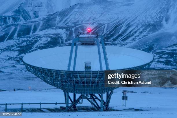 eiscat svalbard radar, northern light observatory in longyearbyen during the dark season with its blue light in the winter. - summit station stock pictures, royalty-free photos & images