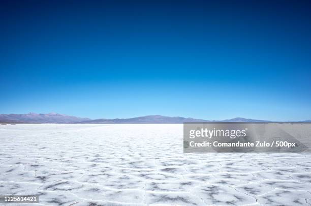 landscape with salt flat, argentina, san salvador de jujuy, jujuy province - salinas grandes stockfoto's en -beelden