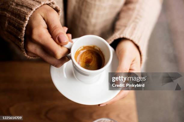 coffee cup, lady's hands holding coffee cup, woman holding a white mug, espresso in white cup - coffee cups stock pictures, royalty-free photos & images