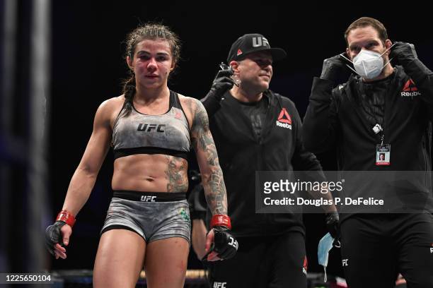 Claudia Gadelha of Brazil exits the octagon after defeating Angela Hill of the United States in their Women's Strawweight bout during UFC Fight Night...