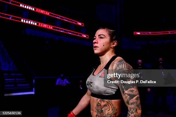 Claudia Gadelha of Brazil looks on after defeating Angela Hill of the United States in their Women's Strawweight bout during UFC Fight Night at...