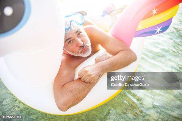 Guy On Inflatable Raft 292 Mask Raft Stock Photos, High-Res Pictures, and Images - Getty Images