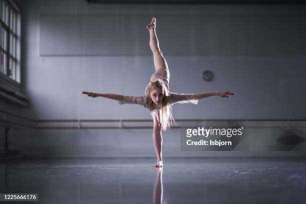 modern jazz dancer practicing. - jazz dancing stock pictures, royalty-free photos & images