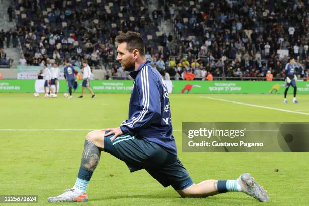 Lionel Messi warms up prior the international friendly match between Argentina and Uruguay at Bloomfield Stadium on November 18, 2019 in Tel Aviv,...