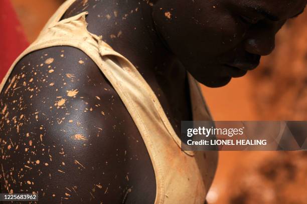 Men working in a gold mine is pictured on February 23, 2009 in Chudja, near Bunia, north eastern Congo. The conflict in Congo has often been linked...
