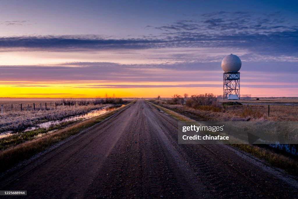 Weather radar tower in sunset